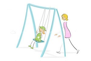Mom pushing daughter on swing